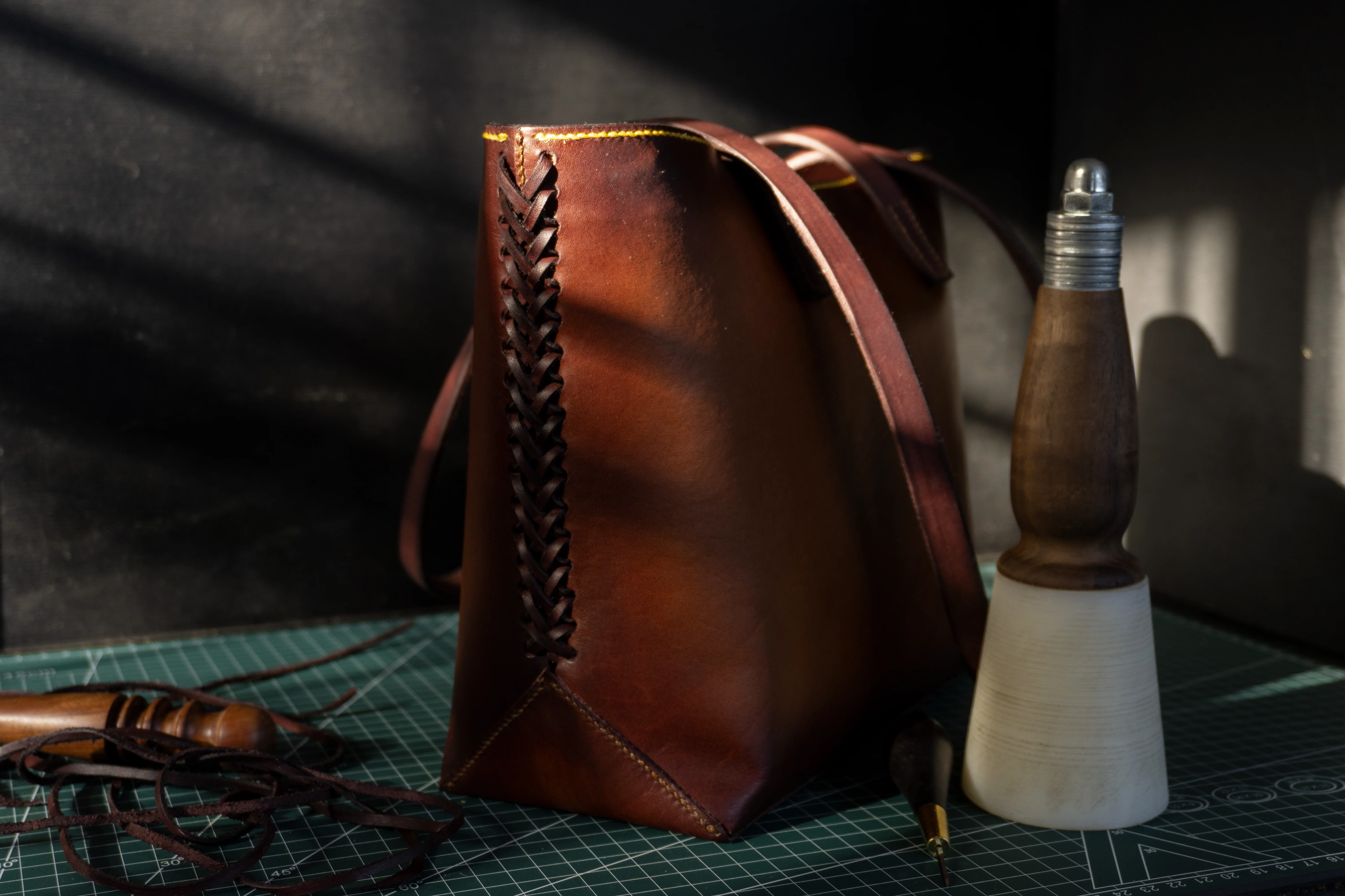 Cut by hand. Stitched to last.